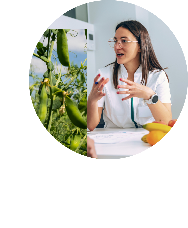 Female nutritionist in white shirt reviews dietary sheet with client.